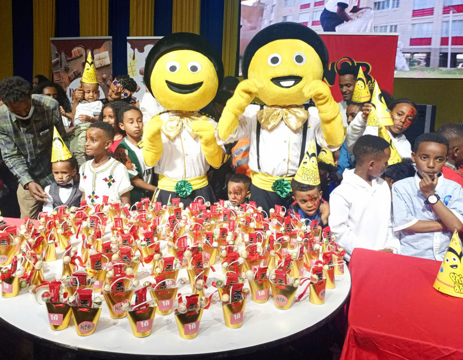 NIB Chocolate Giving Free Gifts in YeEthiopia Lijoch (Ethiopian Kids) Birthday Setting
