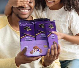 Nib Chocolate - A girl giving a gift to her father
